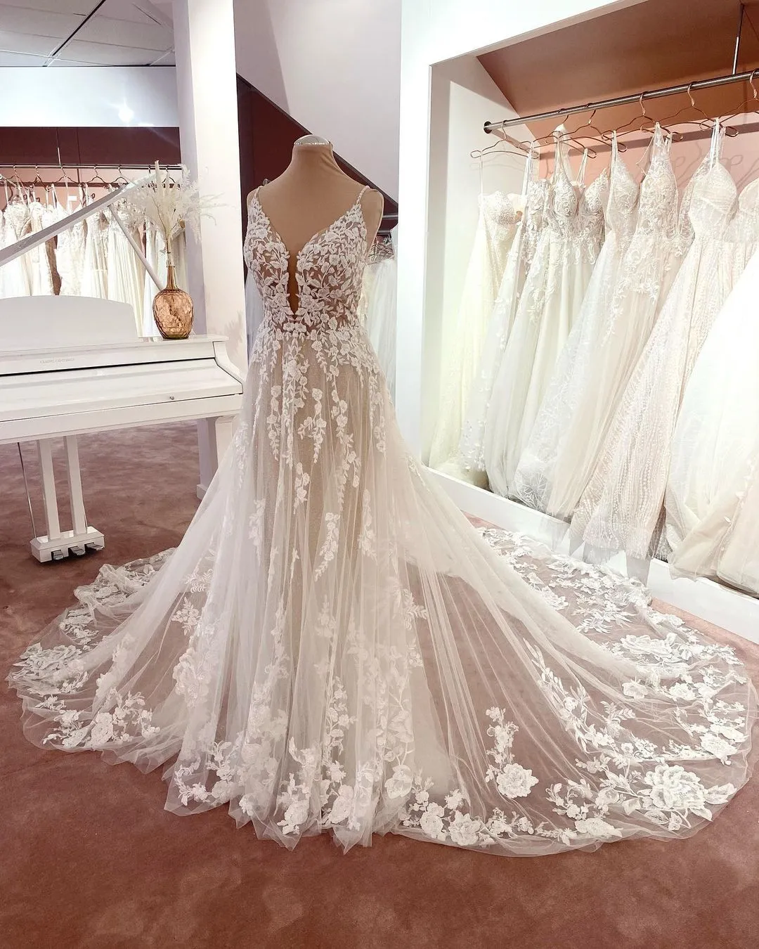 Long A-Line V-Neck Sleeveless Floral Lace Wedding Dress with Tulle and Boho Style