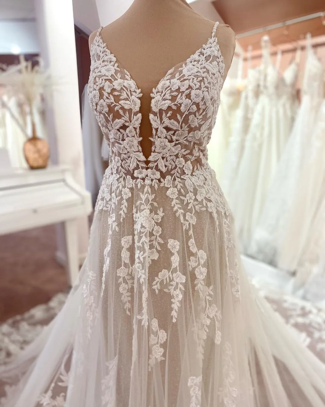 Long A-Line V-Neck Sleeveless Floral Lace Wedding Dress with Tulle and Boho Style